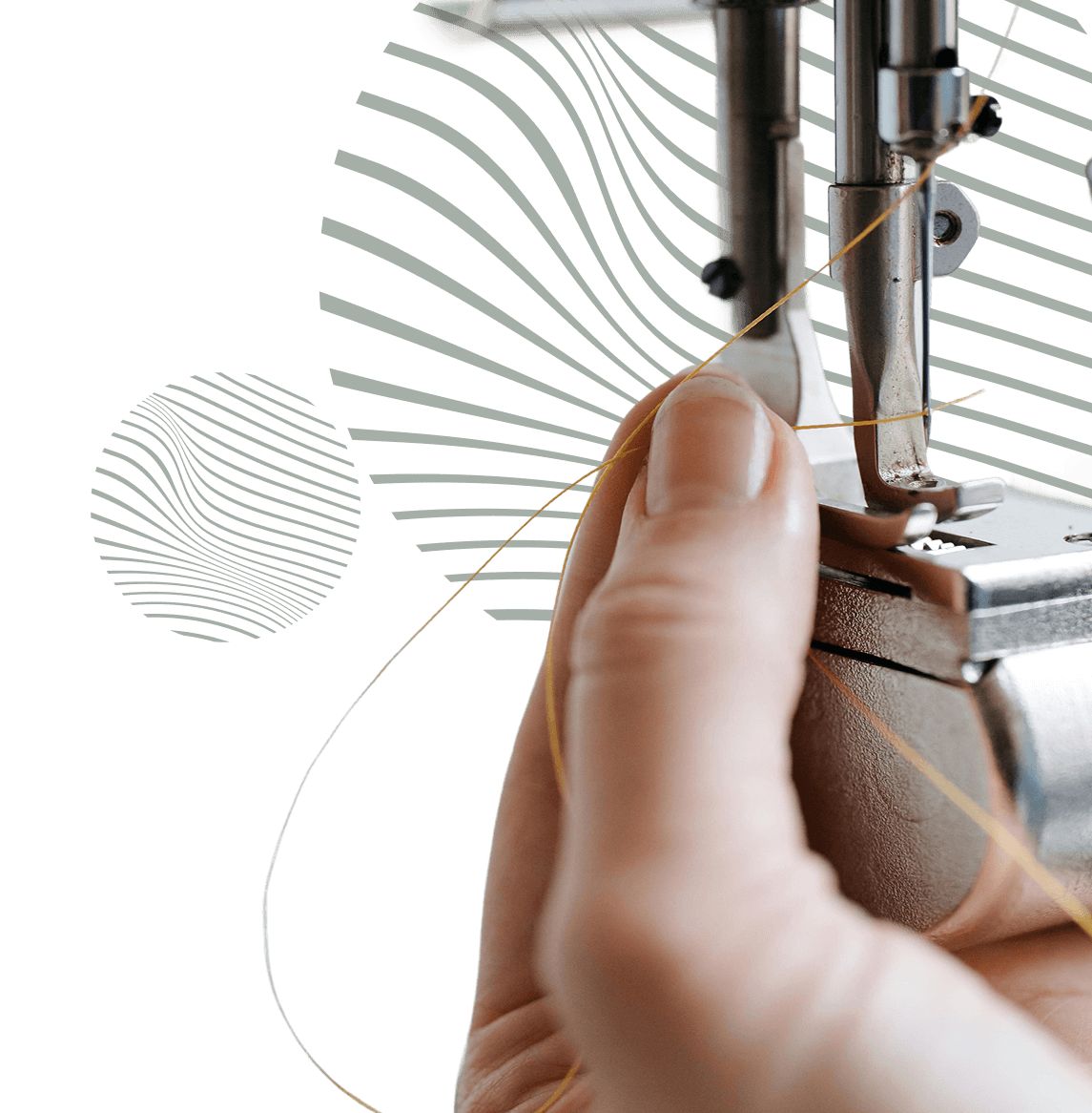 Close up of a sewing machine and hand